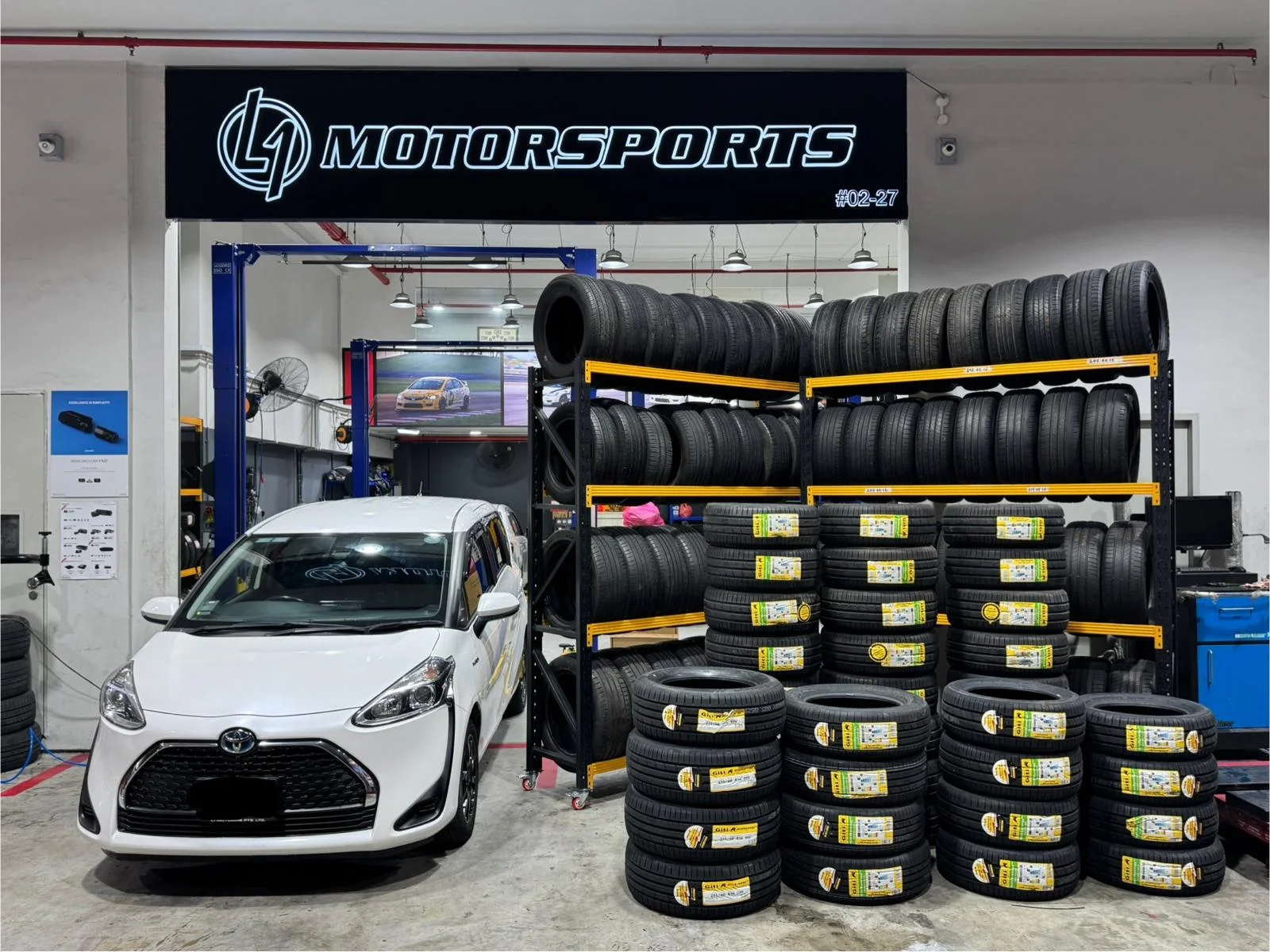 Giti tyre rack at the L1 Motorsports workshop