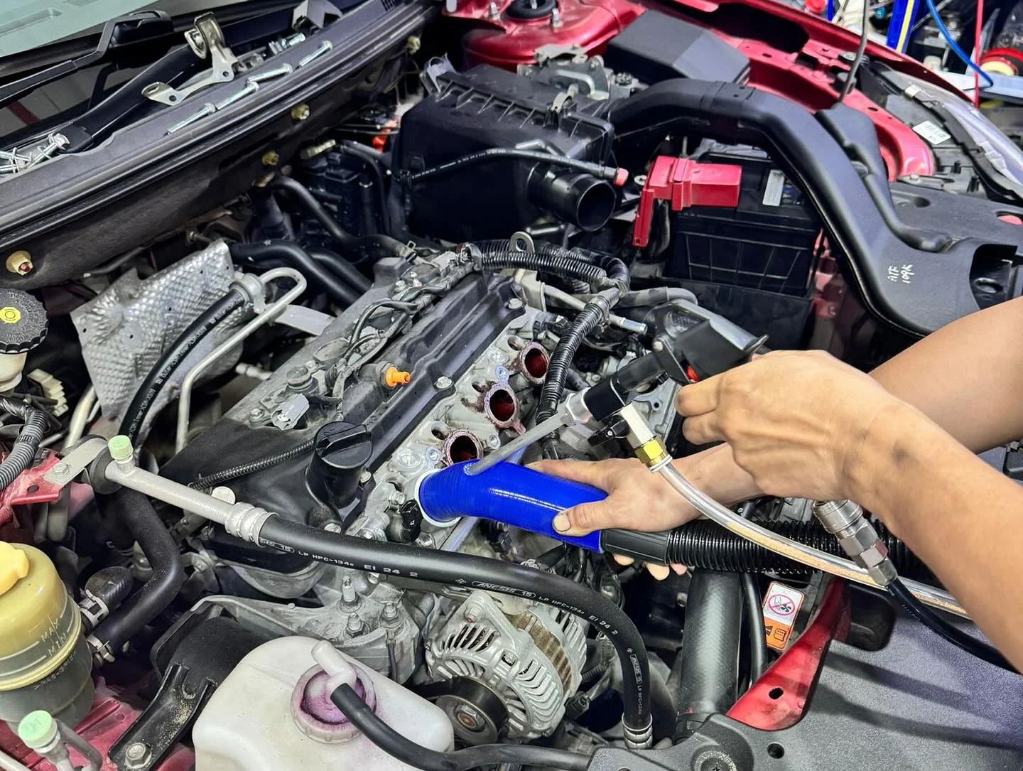 Engine bay walnut blasting at L1 Motorsports